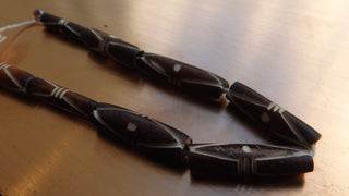 Bone Beads (Bali Indonesia).  *8 Carved Tube Bone Beads Brown .  Approx 23 x 8 mm in size.
