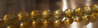 Citrine (AA) FACETED 8mm Rounds.  16" strand.  Approx 52 beads.