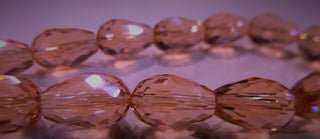 Glass Drop (Faceted) Pink.  15 x 10mm *10 Beads per strand