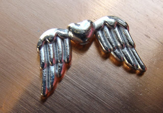 Metal Bead -(Wing) (WNGHeart)  Wing. 18.5mm x 11mm.   Silvertone. (See drop down for bulk pricing)