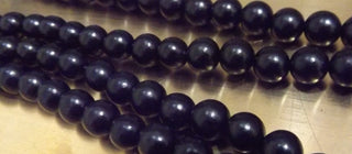 Wood (EBONY) 6 mm rounds *approx 108 beads.  (includes guru bead)