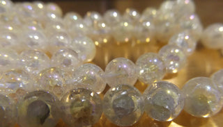 Natural Crackle Quartz Crystal ( 9mm Rounds).  16" Strand (approx 44 Beads)