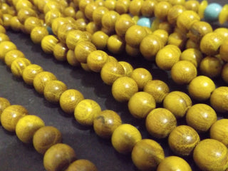 Wood (Sandalwood) *8mm Rounds (approx 100 Beads).  (includes guru bead)
