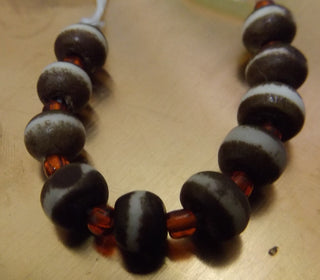 Bone Beads (Bali Indonesia).  *10 Rondelle Bone Beads. Brownwith White Center Stripe .  Approx 12 x 5 mm in size.