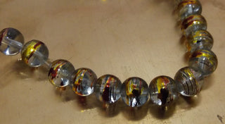 Drawbench Glass Round (Clear with Red/Gold Multi Color)  15" strand (8 mm Beads)