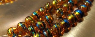 Drawbench Glass Round (Sunset Orange with Multi  Swirls)  15" strand ( 8 mm Beads)