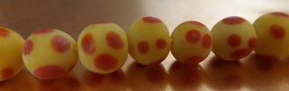 Glass Indonesian / Bali Beads.  approx 10mm Round.  Yellow with Red Dots  *Priced per 10 Beads.
