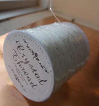 Crystal Thread (Stretchy Cord).  .See Drop Down for Size Options (Packaging will vary depending on roll)
