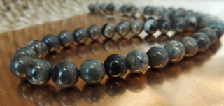 Natural  Quartz  ( 8 mm Rounds).  15" Strand (approx 48 Beads)