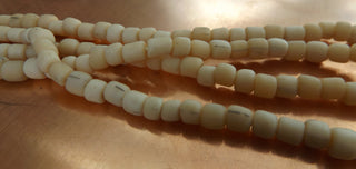 Indonesian Glass "Tube" beads.  approx 4 x 4mm.  24" strand.  Approx 150 Beads/ Strand.  *Soft Sunshine