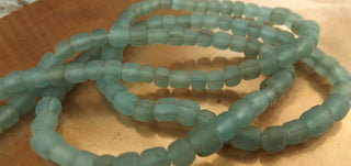 Indonesian Glass "Tube" beads.  approx 4 x 4mm.  24" strand.  Approx 150 Beads/ Strand.  *7UP Bottle Green