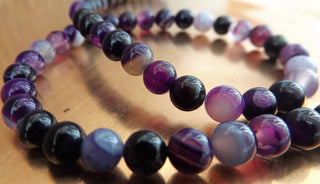 Agate (6mm rounds) 15.5" strand.  approx 59 beads.  Striped Purple