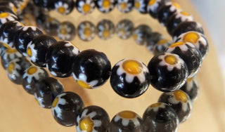 Glass Round (Black with Daisy in White and Yellow)  15" strand ( See Drop Down for Size Options)