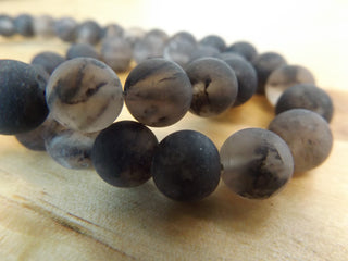 Watermellon Stone ( rounds) 15.5" strand.  See drop down for size options.  Grey Black/Clear