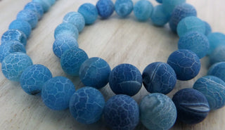 Fire Agate (8mm rounds) 15.5" strand.  approx 47 beads.   Summer Skies Blue