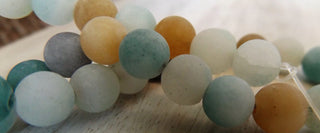 Agate (Crazy Agate)  (8mm rounds) 15.5" strand.  approx 43 beads.  *Frosted Multi's (Similar to Amazonite)