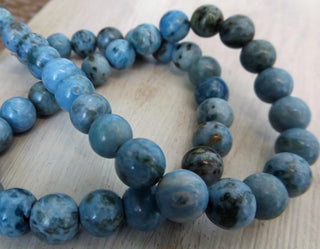 Agate (Crazy Agate)  (8mm rounds) 15.5" strand.  approx 43 beads.  * (Softer Blue)