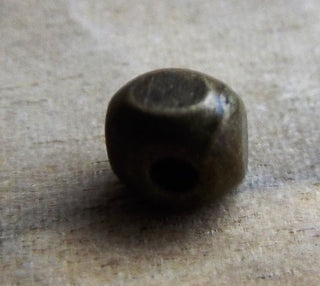 Metal Bead (Antique Bronze Color)  Cuboid.  *4.5x4.5x3.5mm.  Hole 1mm.   Packed 50