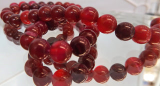 Agate (8mm rounds) 15.5" strand.  approx 43 beads.  "Cerise"