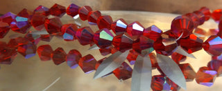Bicone (Glass)  * Rich Red w/ Half AB Plating  6mm size.  (approx 50 beads strand).