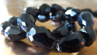 Glass Drop (Faceted) Black AB.  *See Drop Down for Size Options