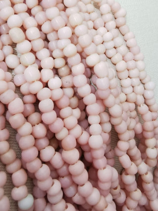 Glass Indonesian / Bali Beads.  *Recycled Glass.  Imperfect Rounds approx 5mm size (Approx 140 Beads)  Organic Pale Pink color.