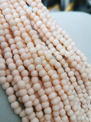 Glass Indonesian / Bali Beads.  *Recycled Glass.  Imperfect Rounds approx 5mm size (Approx 140 Beads)  Organic Softest Peach Coral color.