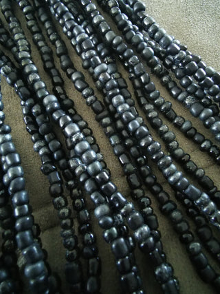 Glass Indonesian / Bali Beads. (Shades of Black) Size 6 Seed Bead Size.  40 inch strand.  Approx 400 beads/ strand