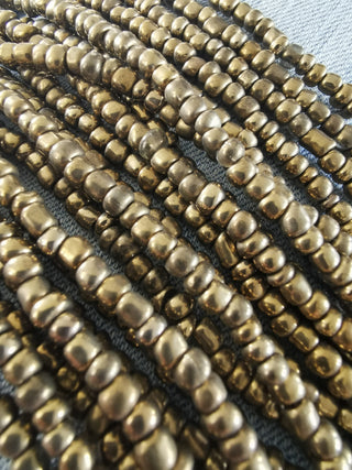 Glass Indonesian / Bali Beads. (Iced Antique Bronze) Size 6 Seed Bead Size.  40 inch strand.  Approx 400 beads/ strand