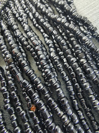 Glass Indonesian / Bali Beads. (Iced Black) Size 6 Seed Bead Size.  40 inch strand.  Approx 400 beads/ strand
