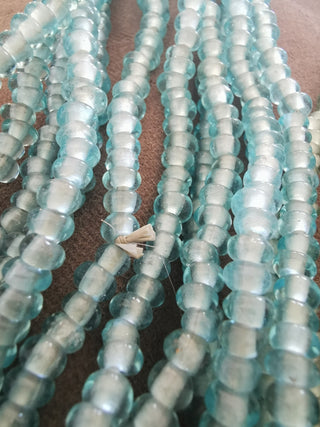 Glass Indonesian / Bali Beads.  *Recycled Glass. (Clear Blue Water) Rondelle/disc shape.    5 x 2.5mm.  approx 185 beads .