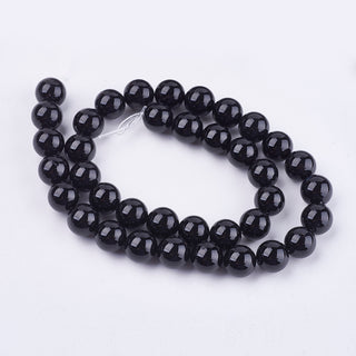 Onyx (Black).  Round.   *See Drop Down for Size Options.  (16" Strand)