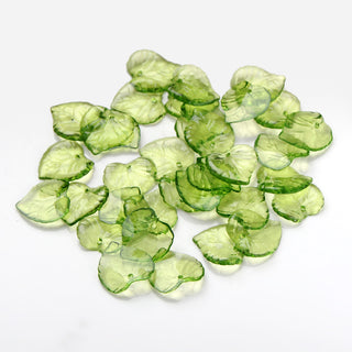 Acrylic Leaf Transparent Green.  Size15mm long, 15mm wide, 2mm thick, hole: 1.5mm (Packed 25 Leafs)