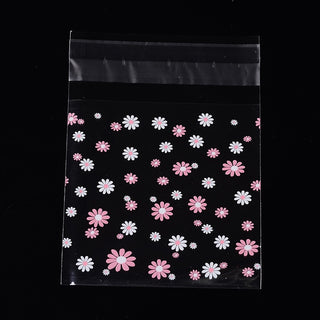 OPP Celophane Bags.  Clear with Flower Pattern.  10 x 7 cm.   *Packed 100 Bags.