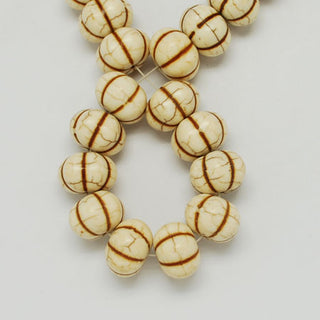 Howlite "Pumpkin Style" Beads.  17 x 12mm.   Cream and Tan.   Approx 34 Beads.
