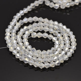 Crystal Electroplate Bicone Glass Bead Strands, (AB Color Plated Over Ghost White). Faceted, AB Color Plated, 3x3mm, Hole: 1mm