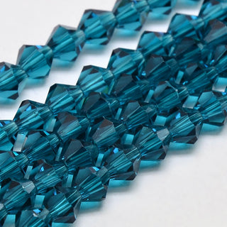 Bicone 3 x 3mm.  Faceted.  Dark Cyan (Steel Blue).  Approx 120 Beads/ Strand.