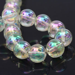 Glass Beads.  Rainbow Plated on a Clear Glass. (Round)  6mm.  (approx 60 beads)